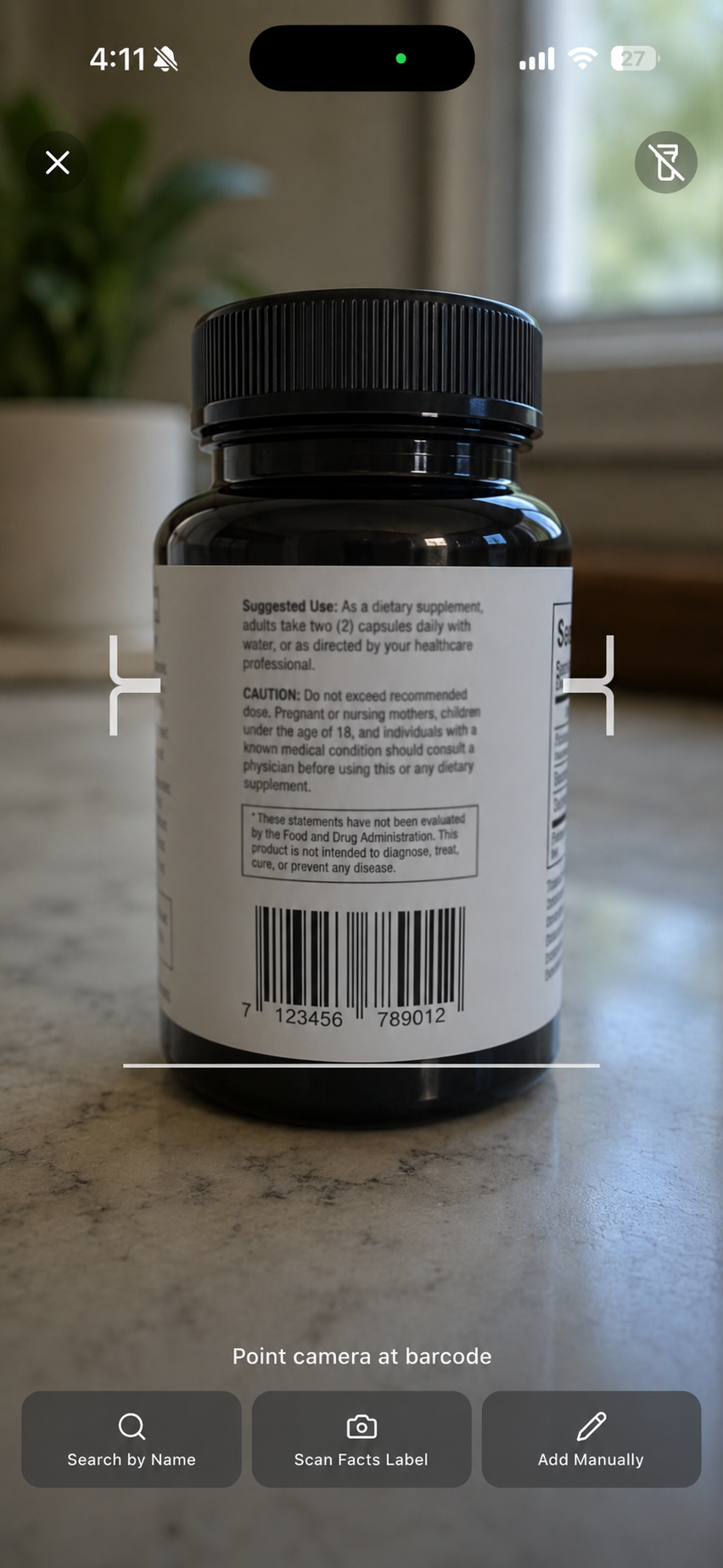 StackIQ supplement scanner screen — point the camera at a supplement barcode or label